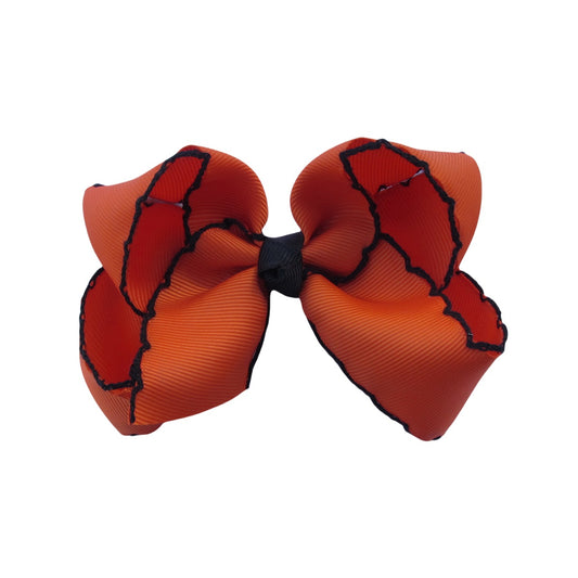 4 IN Torrid Orange w/Black stitching Moonstitch Hair Bows on a double prong alligator with Plain center Wrap